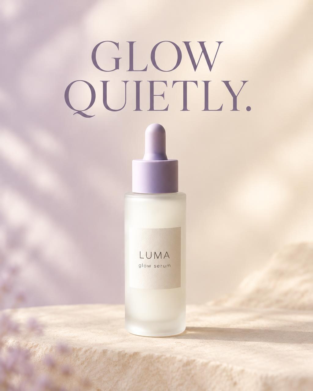 LUMA glow serum ad with the words Glow quietly in large lavender type above the bottle