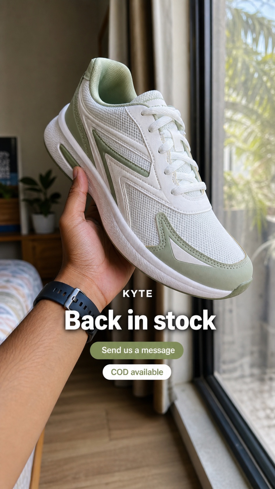 Personal-feeling 9:16 WhatsApp Status ad of a hand holding a white and sage sneaker up to window daylight with the headline Back in stock, a Send us a message button, and a COD available badge in the central band